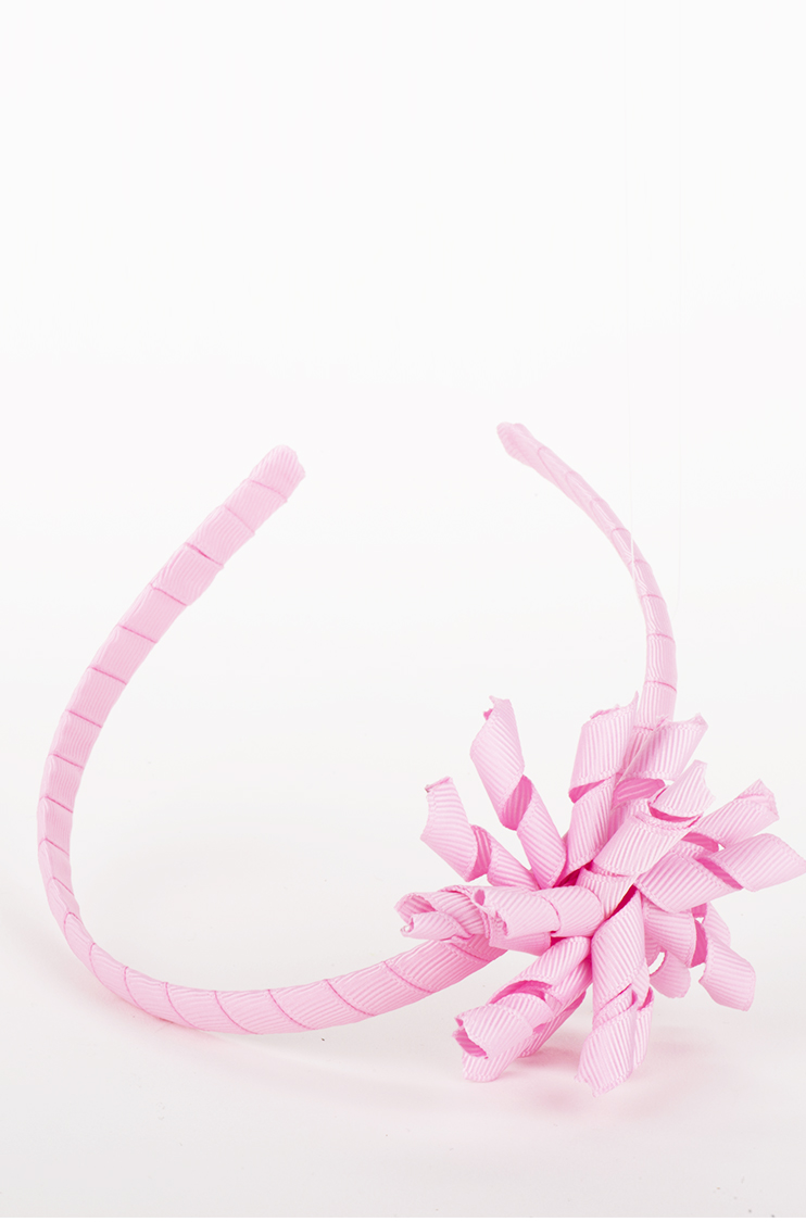 Puslu pembe taç